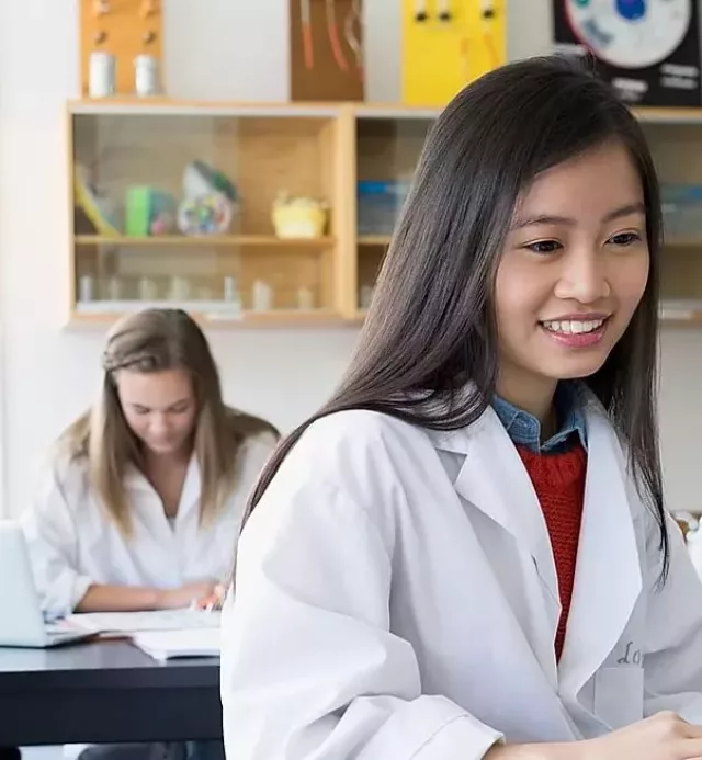 Female medical student in class